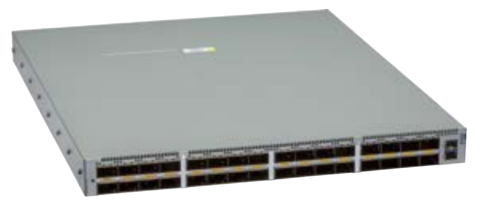 Gray metal Arista DCS-7050DX4-32S-F network switch with 32 ports and small yellow label on top surface
