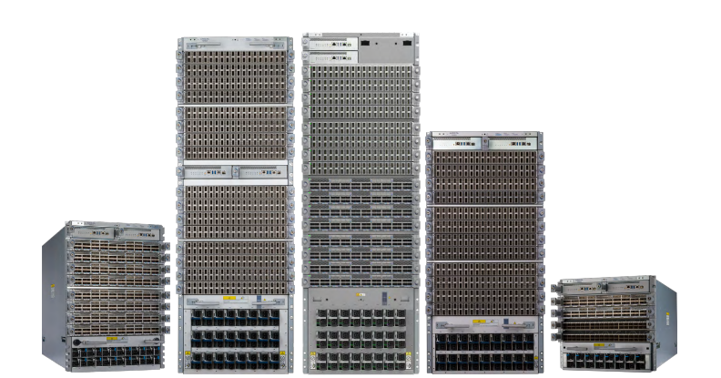 Silver-colored rack-mounted arista dcs-7816l-ch network switches with ports and ventilation slots in modular chassis back view