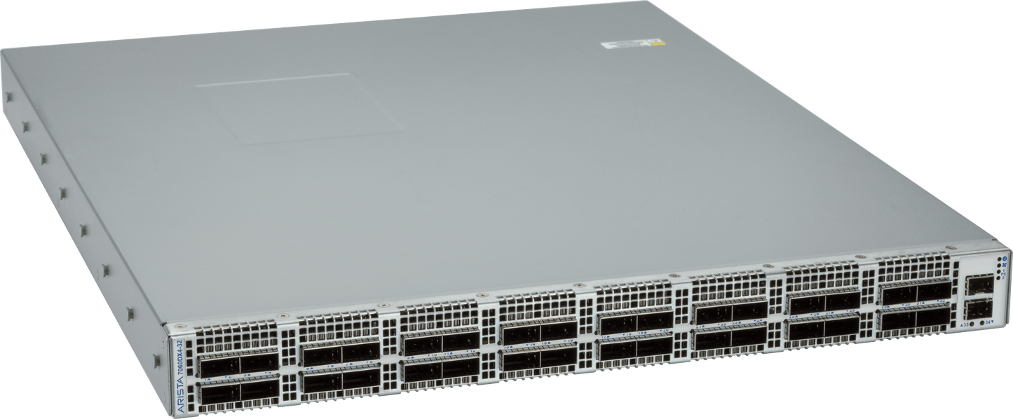Gray metal arista dcs-7060dx4-32-f server rack with multiple ports and ventilation slots on the front panel