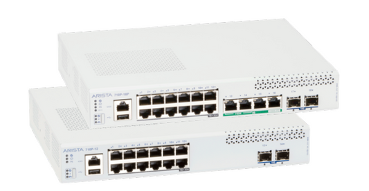 White arista kit-ccs-710 network switches back side with multiple ethernet ports and ventilation grilles