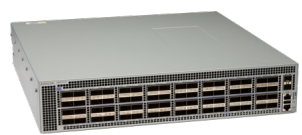 Gray metal arista dcs-7260cx3-64-f 64-port 100g switch with multiple ports and ventilation grilles backside view