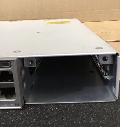 Silver metallic cisco c9300-24p-e 24-port gigabit poe+ switch rear view with modular 24-port ethernet switch module