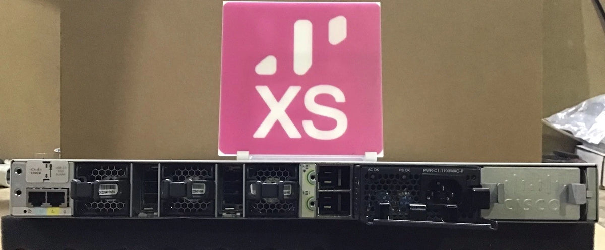 Black cisco c9300-48uxm-a network switch with 48 ports ventilation grilles and pink xs logo sign for multi gig use