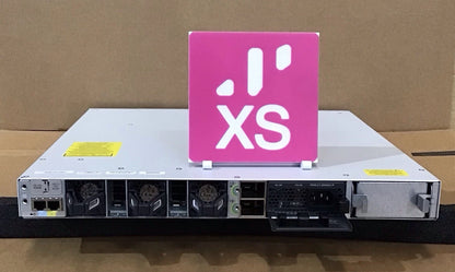 White cisco ucs x-series server with pink xs logo on top shown with cisco catalyst 9300 24-port gigabit switch modular uplink slot