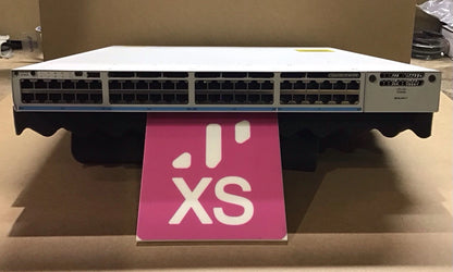 White cisco catalyst 9300 48-port multigig switch with multiple ethernet ports and pink xs sign in front