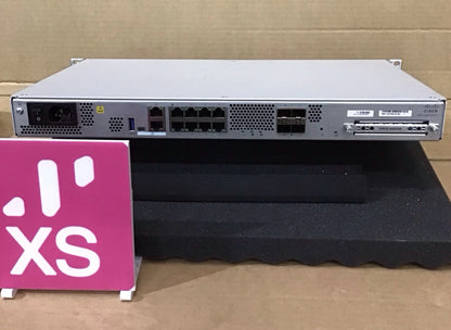 Silver cisco firepower 1120 firewall network switch with multiple ethernet ports and ventilation grilles back view